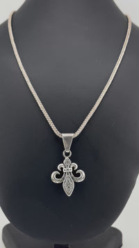 Herringbone necklace with Fleur-de-Lys pendant